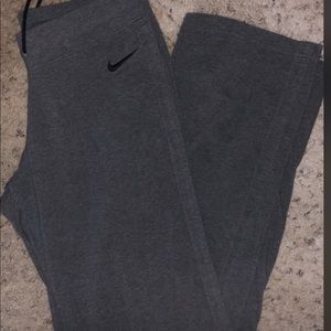 grey and black nike pants